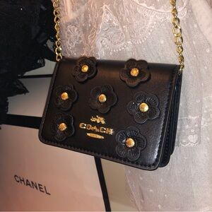 Coach Black Crossbody Bag with Gold Floral Accents Appliqué